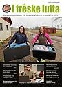 Framsida på tidning två kvinnor som håller i stora lådor med mat.